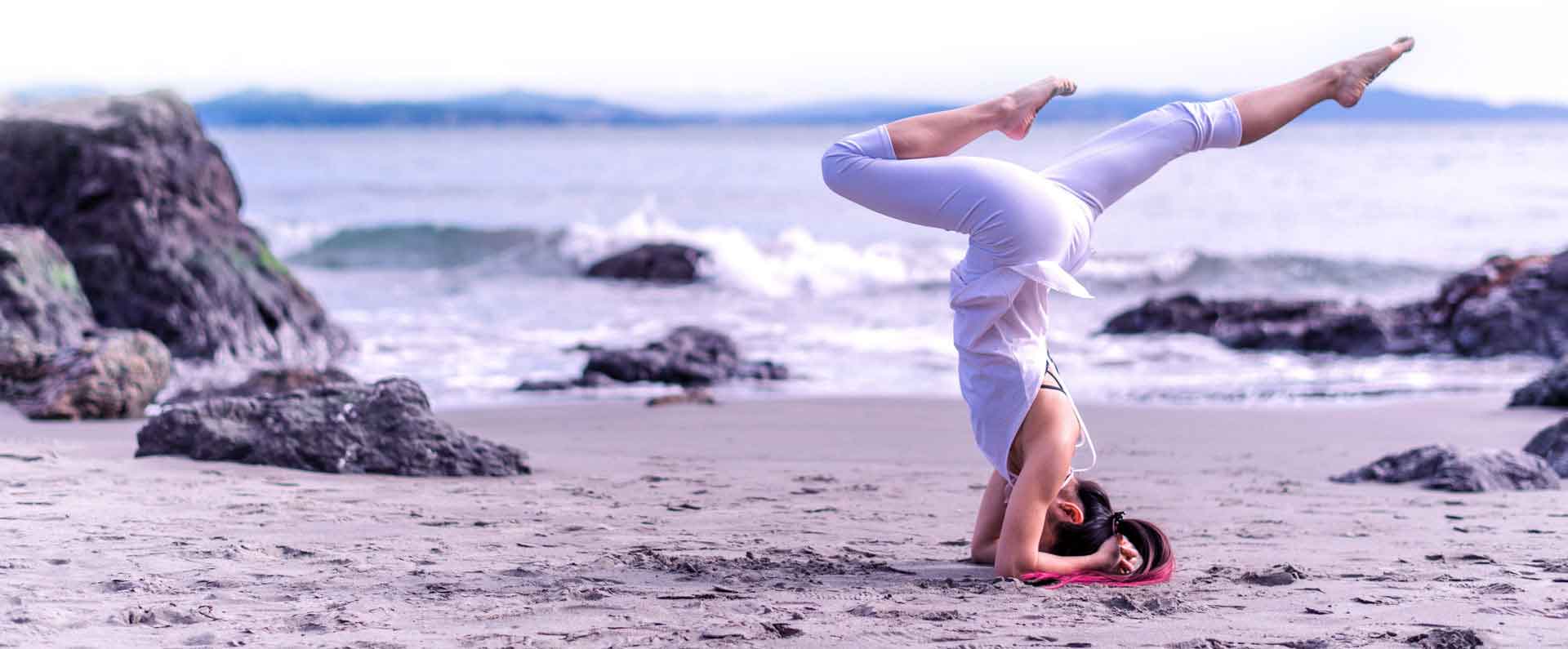Woman on Beach doing Yoga